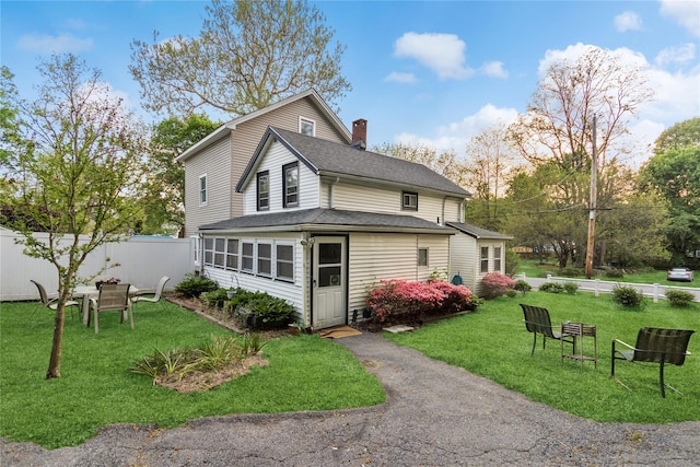 35 Fallkill Ave, Poughkeepsie, NY 12601 - view of side of property with a chimney and a shingled roof