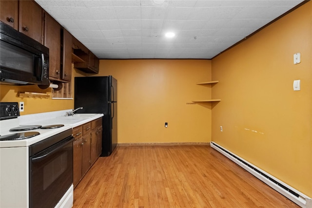 35 Fallkill Ave, Poughkeepsie, NY 12601 - kitchen featuring black appliances, a baseboard radiator, open shelves, light wood-style flooring, and light countertops