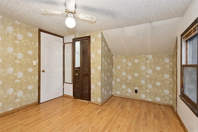 35 Fallkill Ave, Poughkeepsie, NY 12601 - bonus room featuring wood finished floors, wallpapered walls, a textured ceiling, ceiling fan, and baseboards