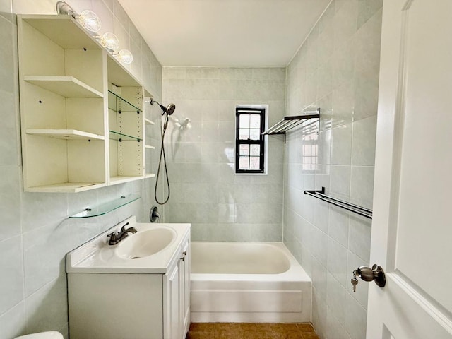 78-16 147th St # # 3C, Flushing, NY 11367 - full bathroom featuring tile walls, vanity,  shower combination, and tile patterned flooring