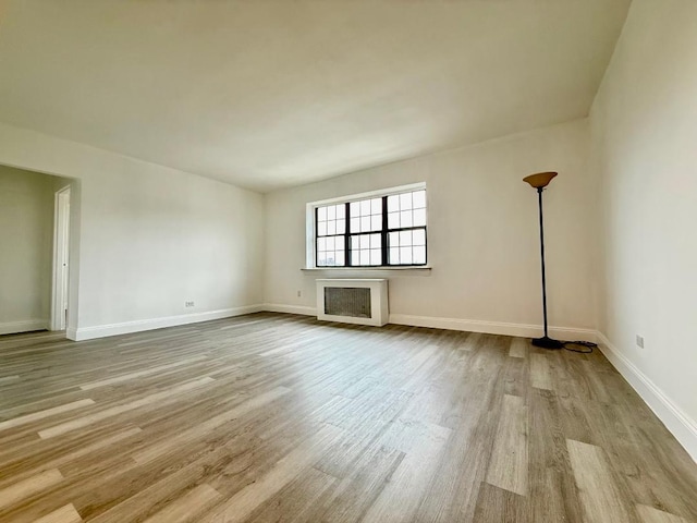 78-16 147th St # # 3C, Flushing, NY 11367 - empty room featuring wood finished floors and baseboards