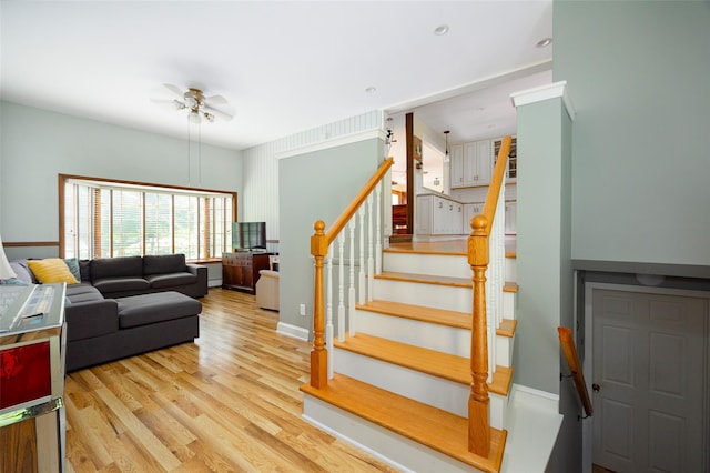 68 Forest Dr, Poughquag, NY 12570 - living room featuring stairs, wood finished floors, ceiling fan, and baseboards