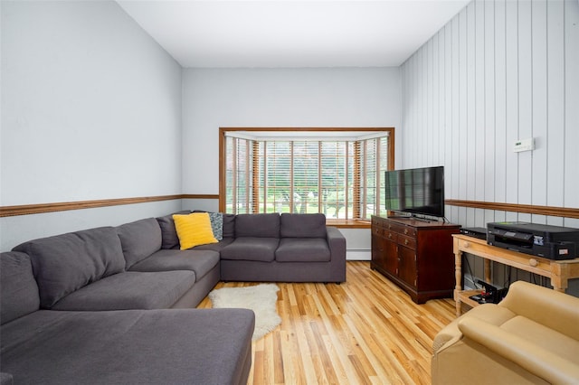 68 Forest Dr, Poughquag, NY 12570 - living room featuring light wood-type flooring and a baseboard radiator