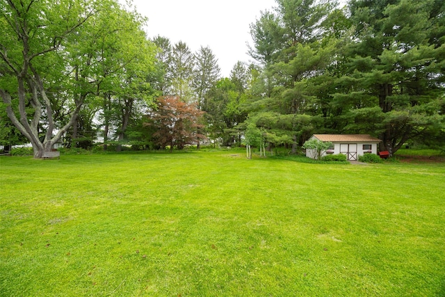 68 Forest Dr, Poughquag, NY 12570 - view of grassy yard with an outbuilding and a shed