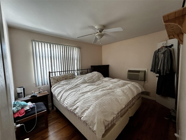 275 Beachview St, Copiague, NY 11726 - bedroom featuring dark wood-style floors, a wall unit AC, and ceiling fan
