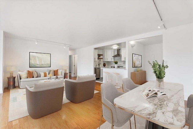 50 Columbus Ave Unit 605, Tuckahoe, NY 10707 - living room featuring rail lighting and light wood finished floors