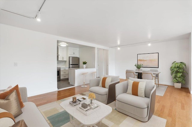50 Columbus Ave Unit 605, Tuckahoe, NY 10707 - living room featuring track lighting and light wood finished floors