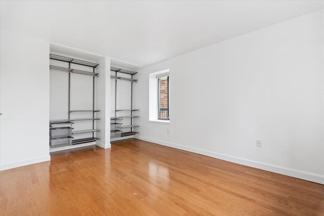 50 Columbus Ave Unit 605, Tuckahoe, NY 10707 - unfurnished bedroom featuring wood finished floors and baseboards