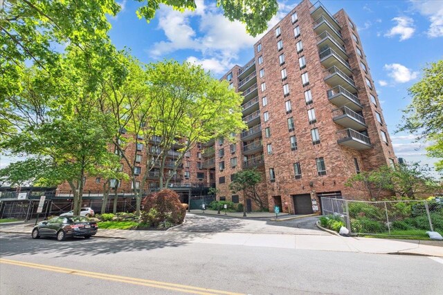50 Columbus Ave Unit 605, Tuckahoe, NY 10707 - view of apartment building / complex featuring a garage