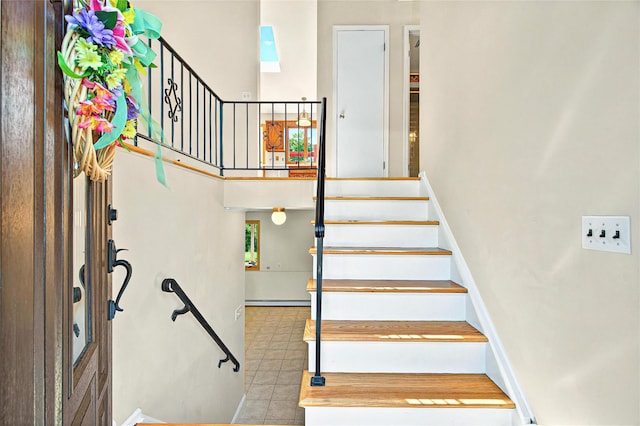 8 Skinner Ct, Tomkins Cove, NY 10986 - staircase with tile patterned flooring and baseboards