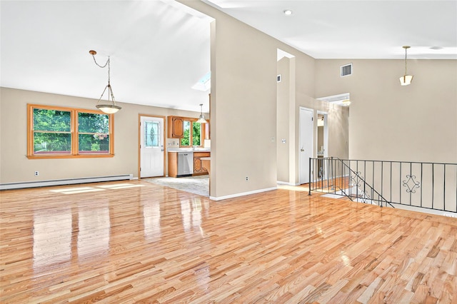 8 Skinner Ct, Tomkins Cove, NY 10986 - unfurnished living room featuring a baseboard heating unit, light wood-style floors, baseboards, and high vaulted ceiling