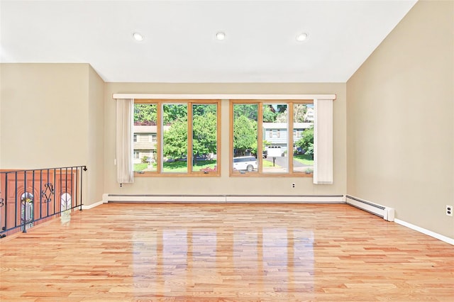 8 Skinner Ct, Tomkins Cove, NY 10986 - unfurnished room featuring wood finished floors, recessed lighting, baseboards, vaulted ceiling, and a baseboard radiator