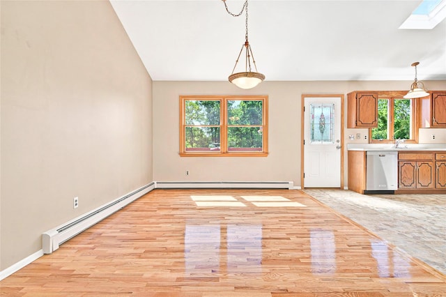 8 Skinner Ct, Tomkins Cove, NY 10986 - kitchen with dishwasher, a baseboard radiator, light wood-style flooring, and light countertops