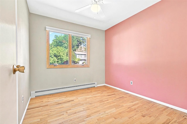 8 Skinner Ct, Tomkins Cove, NY 10986 - empty room with baseboard heating, wood finished floors, ceiling fan, and baseboards