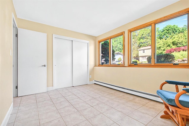 8 Skinner Ct, Tomkins Cove, NY 10986 - sunroom with a baseboard heating unit
