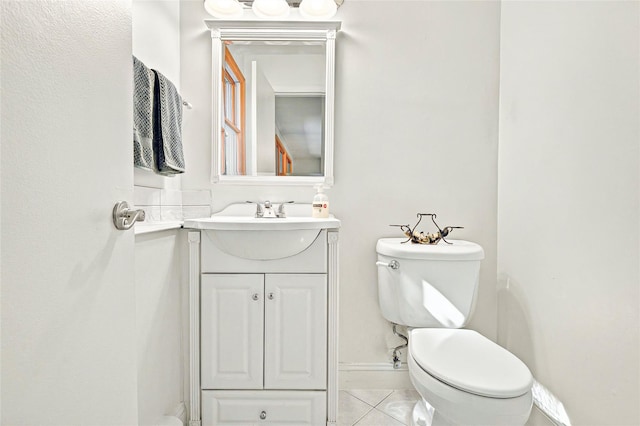 8 Skinner Ct, Tomkins Cove, NY 10986 - bathroom featuring toilet, vanity, tile patterned flooring, and baseboards