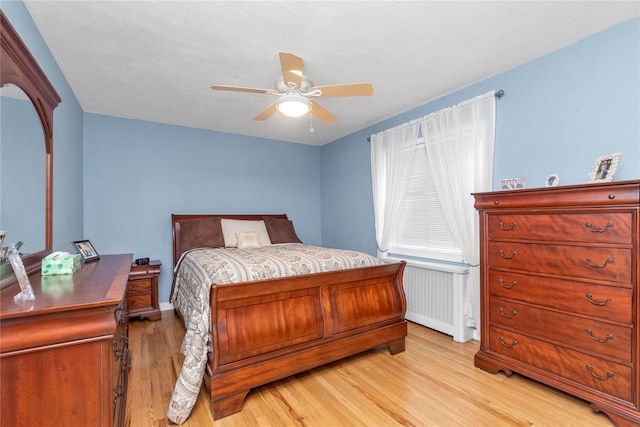 204-08 35th Ave Unit 247, Bayside, NY 11361 - bedroom featuring light wood-style flooring, baseboards, and ceiling fan