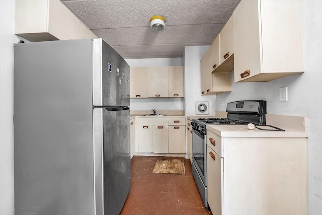 154-04 107th Ave, Jamaica, NY 11433 - kitchen with stainless steel appliances, a sink, light countertops, carpet, and cream cabinets