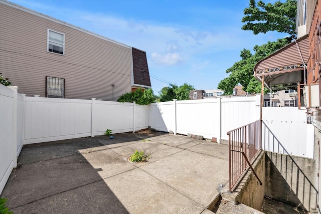 154-04 107th Ave, Jamaica, NY 11433 - view of patio / terrace featuring a fenced backyard