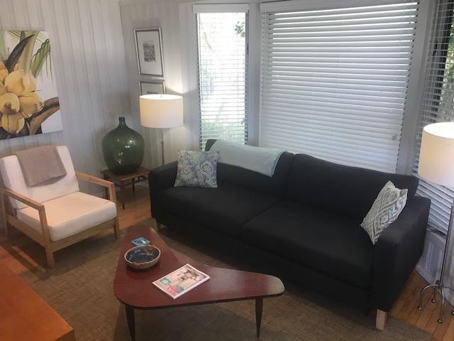 209 Bayview Walk, Cherry Grove, NY 11782 - living room with wood finished floors