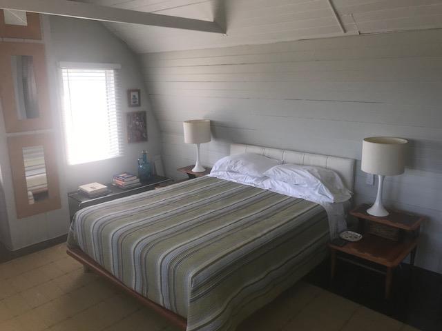 209 Bayview Walk, Cherry Grove, NY 11782 - bedroom featuring tile patterned floors and lofted ceiling
