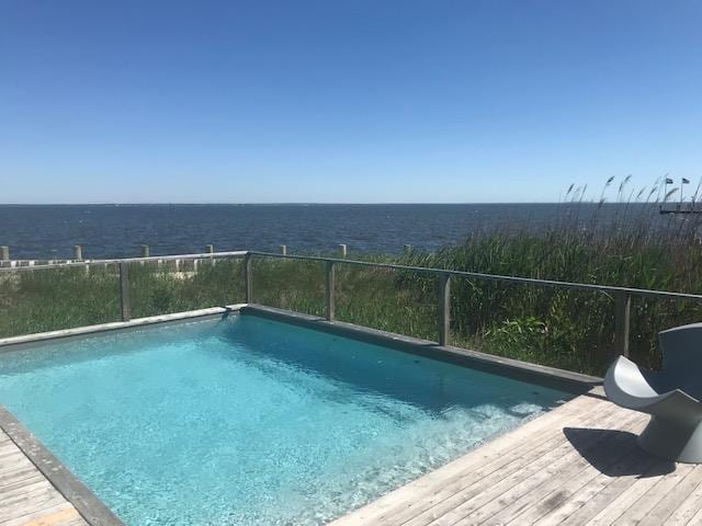 209 Bayview Walk, Cherry Grove, NY 11782 - swimming pool featuring a water view