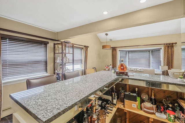 12 Grand Canyon Ln, Coram, NY 11727 - kitchen with stone countertops, healthy amount of natural light, hanging light fixtures, and recessed lighting