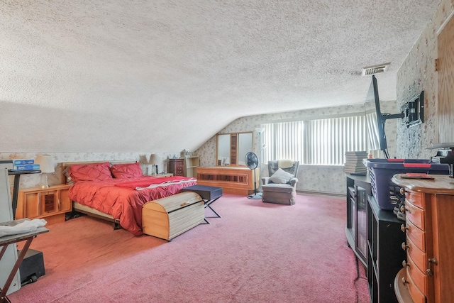 12 Grand Canyon Ln, Coram, NY 11727 - bedroom featuring vaulted ceiling, a textured ceiling, and carpet floors