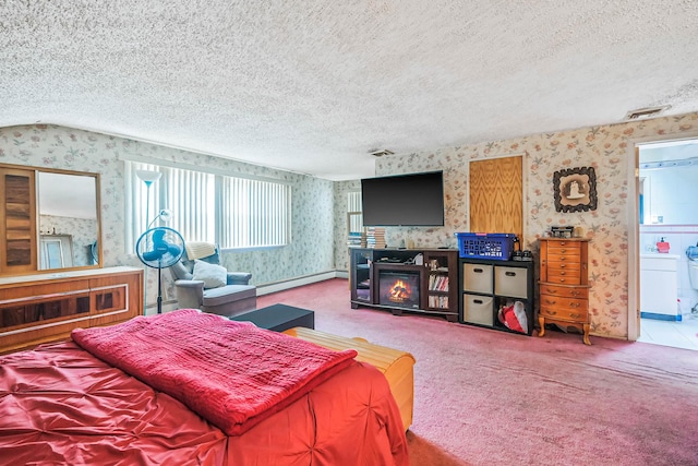 12 Grand Canyon Ln, Coram, NY 11727 - carpeted bedroom featuring wallpapered walls, a textured ceiling, a baseboard radiator, and a glass covered fireplace