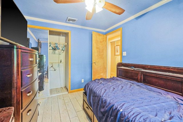 12 Grand Canyon Ln, Coram, NY 11727 - bedroom with ornamental molding, light wood-style floors, a ceiling fan, and baseboards