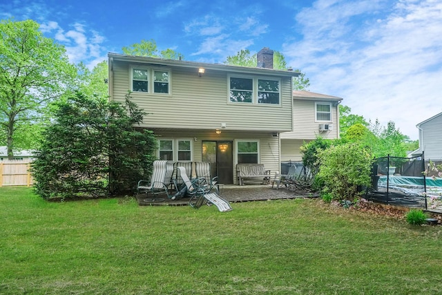 12 Grand Canyon Ln, Coram, NY 11727 - rear view of house featuring a patio area and a chimney