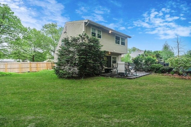 12 Grand Canyon Ln, Coram, NY 11727 - back of property featuring a patio area