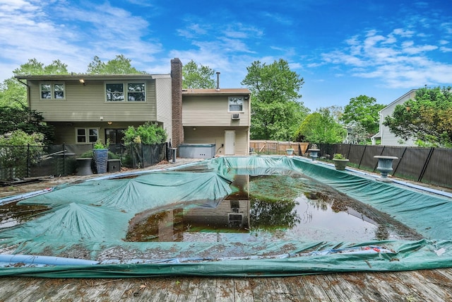 12 Grand Canyon Ln, Coram, NY 11727 - view of pool featuring a fenced backyard and a covered pool