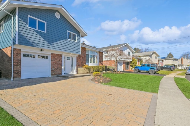 1841A Decatur Ave, Bellmore, NY 11710 - view of front of home featuring a garage, a front lawn, decorative driveway, a residential view, and brick siding