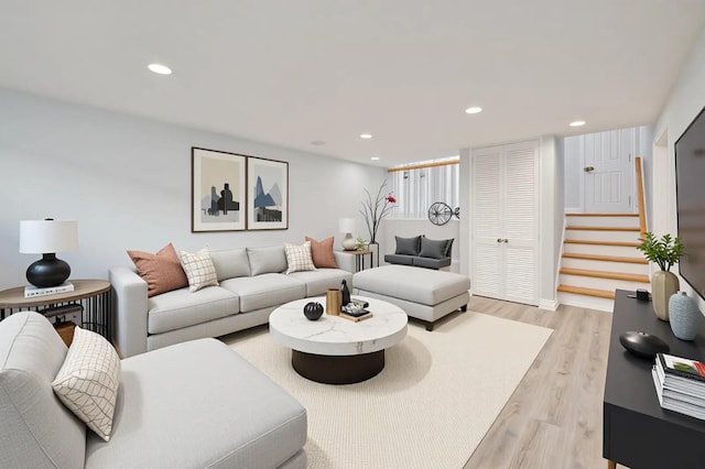 1841A Decatur Ave, Bellmore, NY 11710 - living area featuring light wood-type flooring, stairs, and recessed lighting