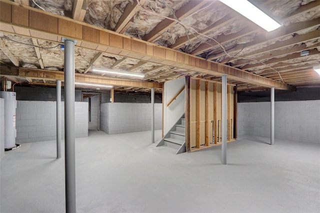 97 Overlook Dr, Mastic Beach, NY 11951 - unfinished below grade area featuring water heater and stairway