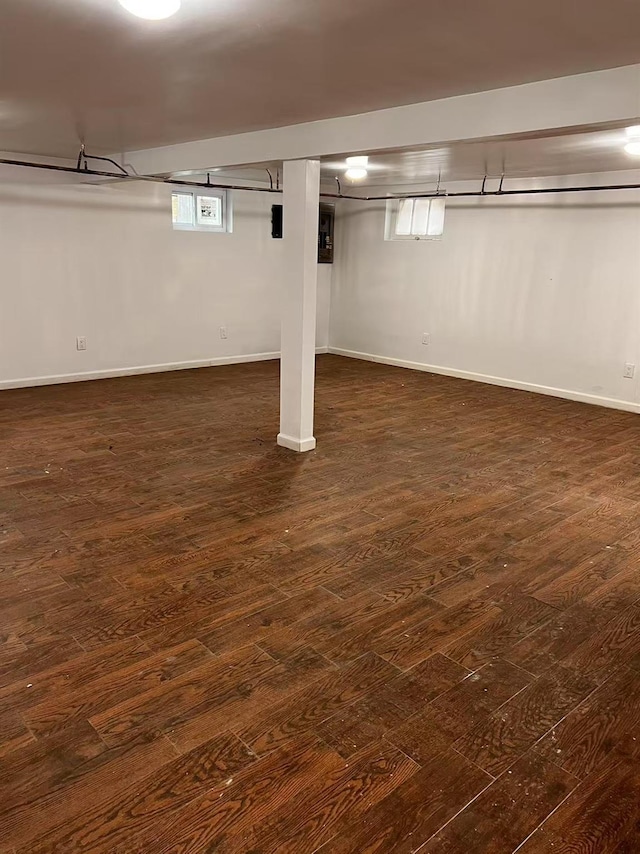 97 Hungry Harbor Rd, Valley Stream, NY 11581 - basement with dark wood-style floors and baseboards