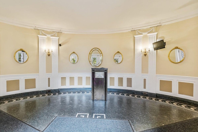 76-36 113th St Unit 1A, Forest Hills, NY 11375 - detailed view of crown molding, a decorative wall, and wainscoting