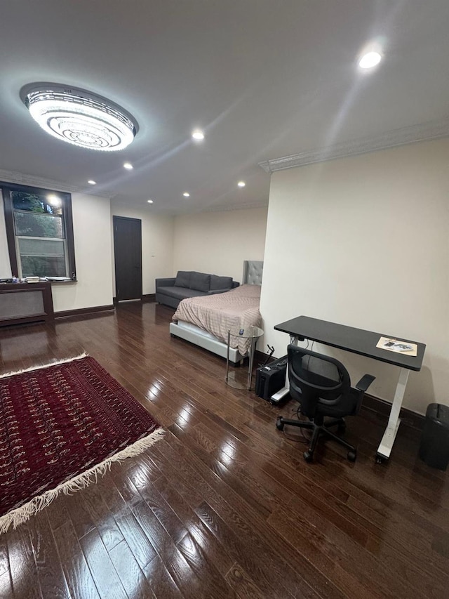 74-45 Yellowstone Blvd Unit 2A, Forest Hills, NY 11375 - bedroom featuring hardwood / wood-style floors, crown molding, and baseboards
