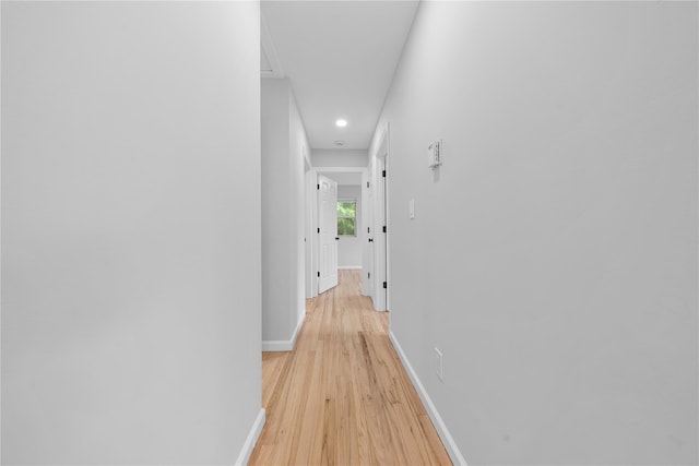 40 S 29th St, Wyandanch, NY 11798 - hallway with light wood finished floors, baseboards, and recessed lighting