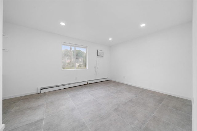 40 S 29th St, Wyandanch, NY 11798 - spare room with baseboard heating, recessed lighting, and a wall unit AC
