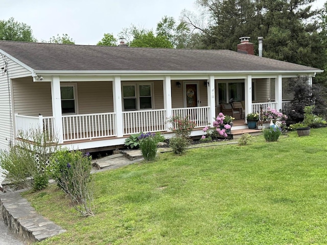 11 Queen Anne Ln, Wappingers Falls, NY 12590 - country-style home featuring a chimney, a porch, a front lawn, and roof with shingles
