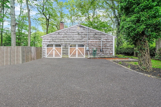 121 Tyler Ave, Miller Place, NY 11764 - view of outdoor structure featuring fence and an outdoor structure