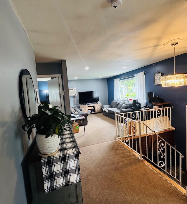 113 6th Ave, Huntington Station, NY 11746 - carpeted living room featuring a chandelier and recessed lighting