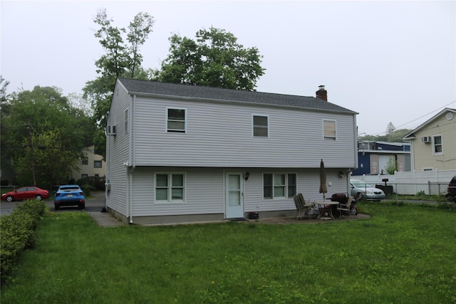 113 6th Ave, Huntington Station, NY 11746 - back of house featuring a chimney