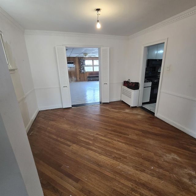 78-10 222nd St, Oakland Gardens, NY 11364 - spare room featuring dark wood finished floors, ornamental molding, and baseboards