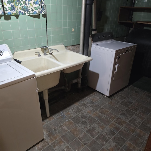 78-10 222nd St, Oakland Gardens, NY 11364 - washroom featuring tile walls and washer and dryer