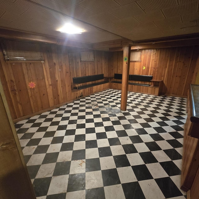 78-10 222nd St, Oakland Gardens, NY 11364 - finished below grade area featuring tile patterned floors and wooden walls