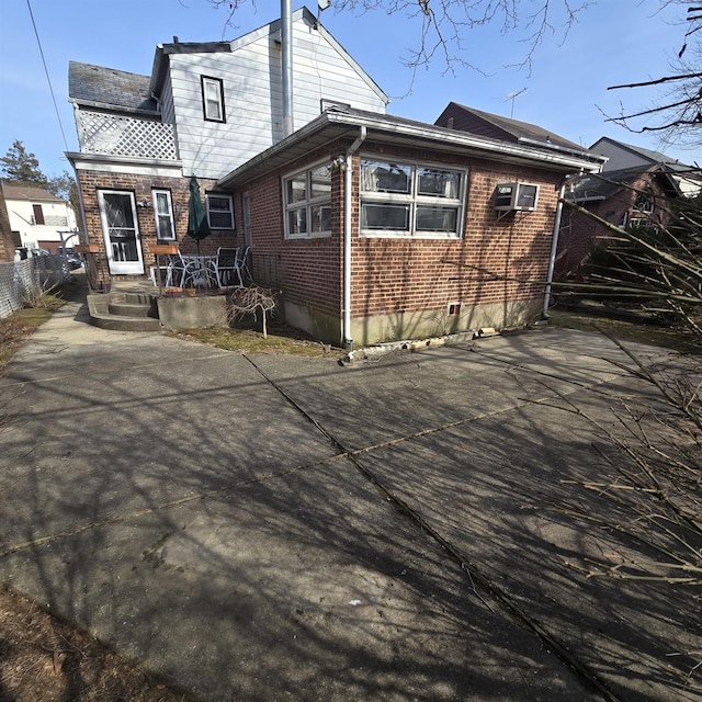 78-10 222nd St, Oakland Gardens, NY 11364 - view of front of property featuring brick siding and a patio