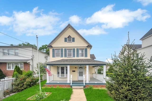 45 Jefferson Ave, Lynbrook, NY 11563 - view of front of house featuring a porch